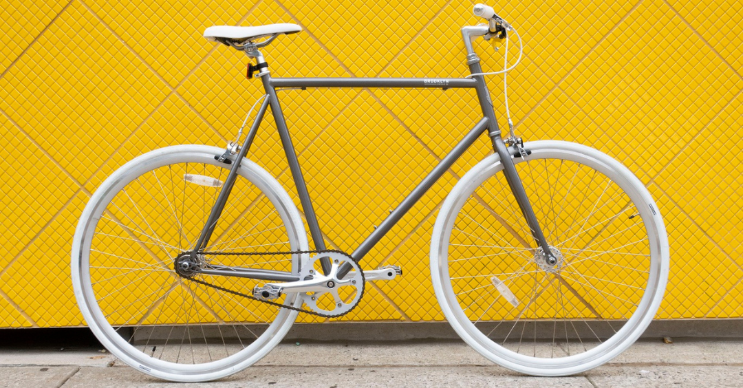 Wythe Fixie Bike against yellow wall